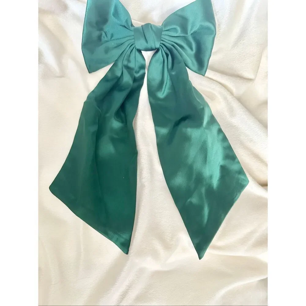 Elegant green satin holiday bow - with Barrett clip close - great for thick hair